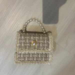 Elegant Tan Woven Handbag with Pearl Handle